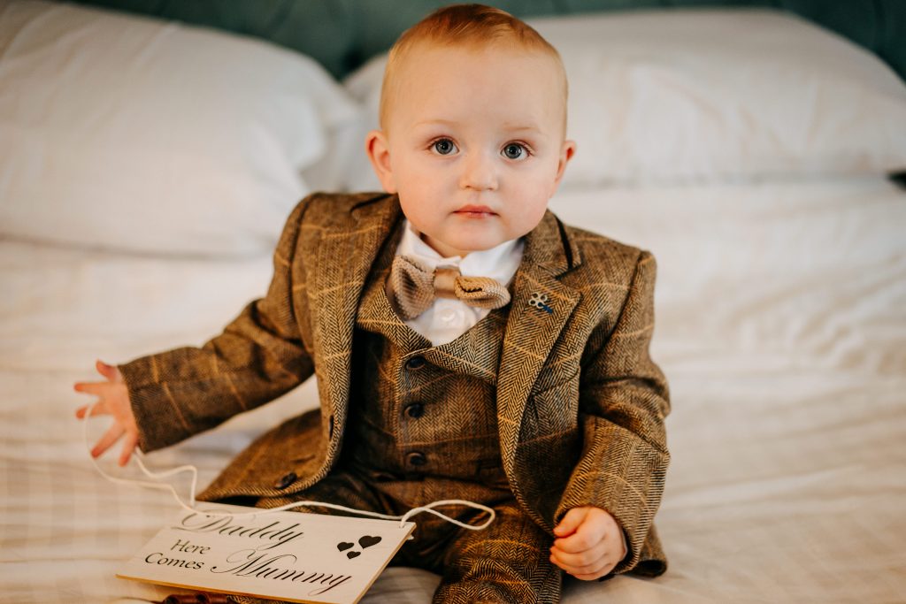 Little boy dressed for a wedding